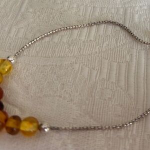 Elegant Silver and Amber Beaded Bracelet